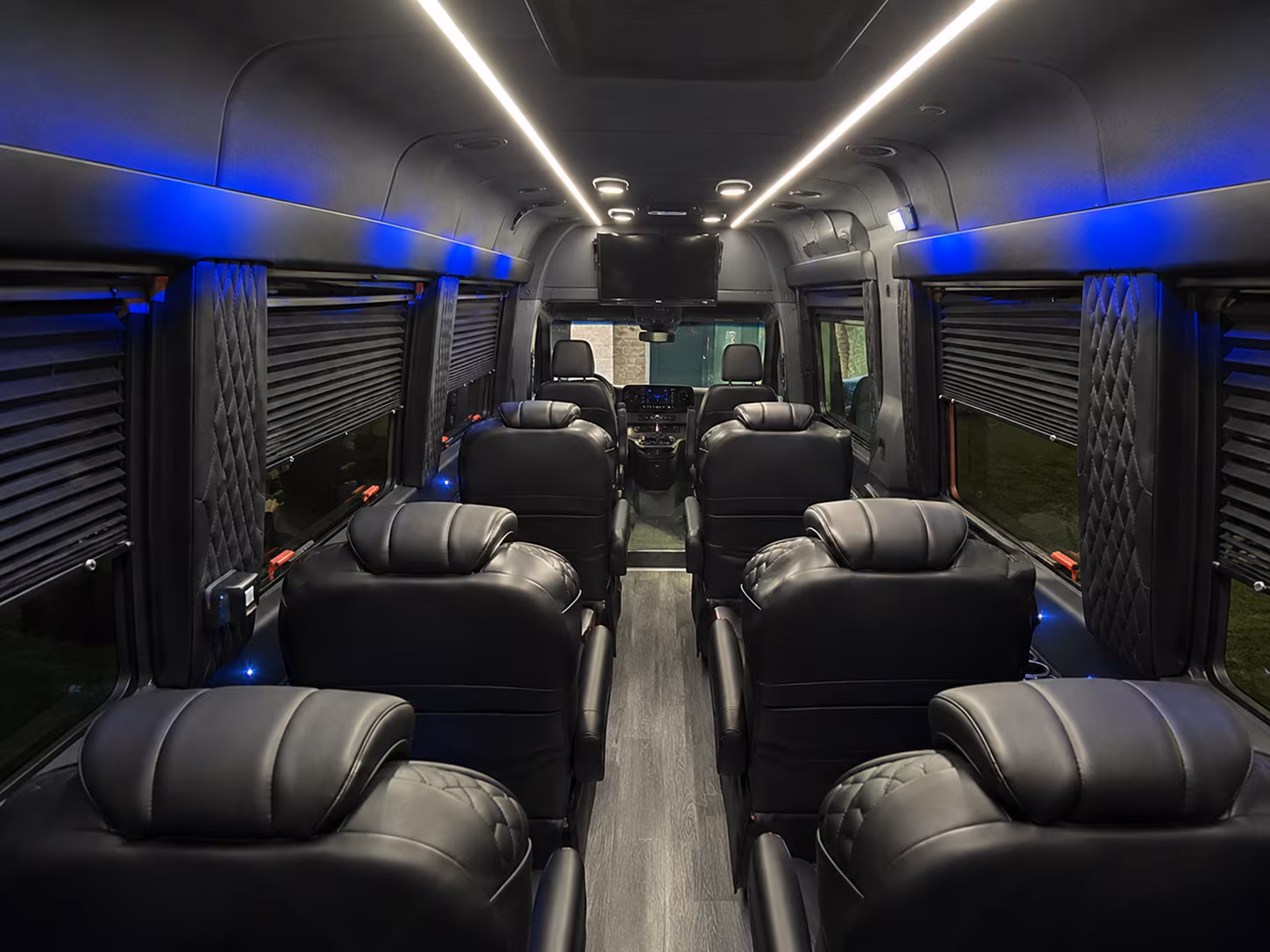 san marcos sprinter van with driver inside